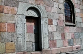 7: Den nu tilmurede stenportal i kirkens sydvæg.
